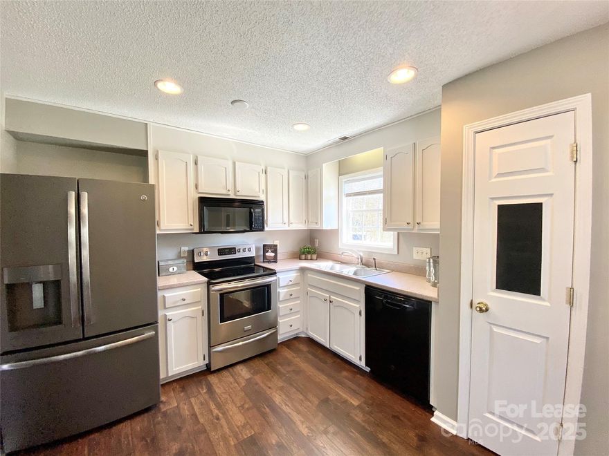 LOCATION! LOCATION! LOCATION! Beautifully Renovated Home Near Kevin Loftin Waterfront Park! The bright and airy breakfast room features charming shiplap walls, adding character and style. The kitchen has been tastefully updated with painted cabinets, solid surface countertops, and stainless steel appliances—including a French door refrigerator. Accent walls in the family room and bathrooms. 
You'll find three generously sized bedrooms, all with newer carpet and ceiling fans for year-round comfort. Outside, there's a large back yard with a convenient storage shed available for tenant use. Located within walking distance of Kevin Loftin Waterfront Park and just minutes from I-85 and Wilkinson Blvd, this home offers unbeatable access to everything you need. Don't miss your chance to live in this beautifully updated and perfectly located property—you’ll love it here!