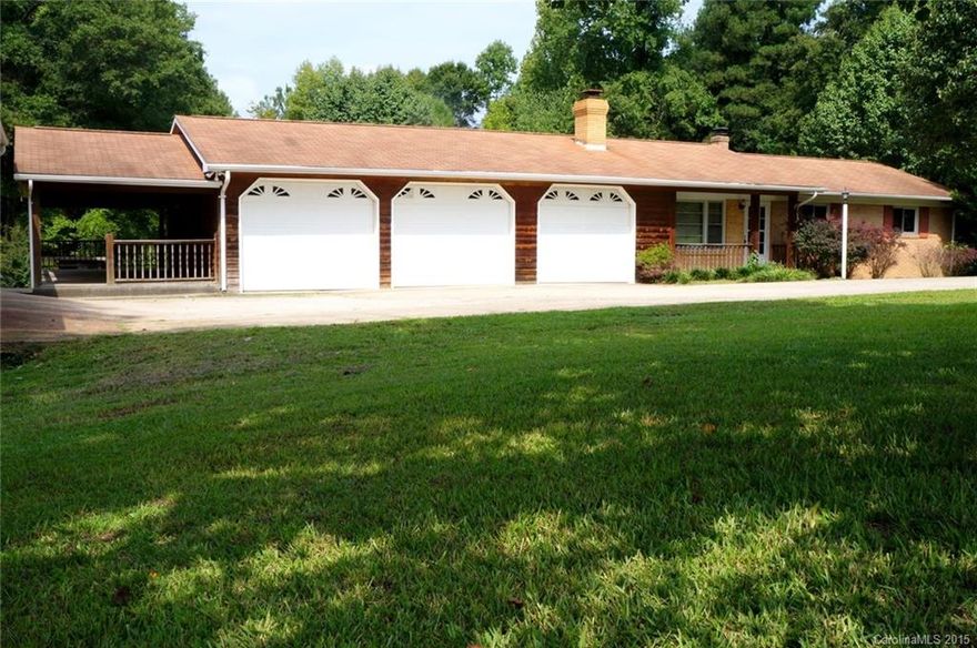 GARAGE, GARAGE,GARAGE!! This 3br 2bath home features all of the parking and storage space a family would ever need! The beautiful 1.5 acre lot offers substantial freedom and privacy to customize this property to your desire. The HUGE laundry room makes the task easier and also serves as a mud area off of the enormous DECK! The Spacious Bonus Room can be purposed for any use, while overlooking the outdoor living space that is completely covered,shaded and ready for rocking chairs. COUNTRY LIVING!