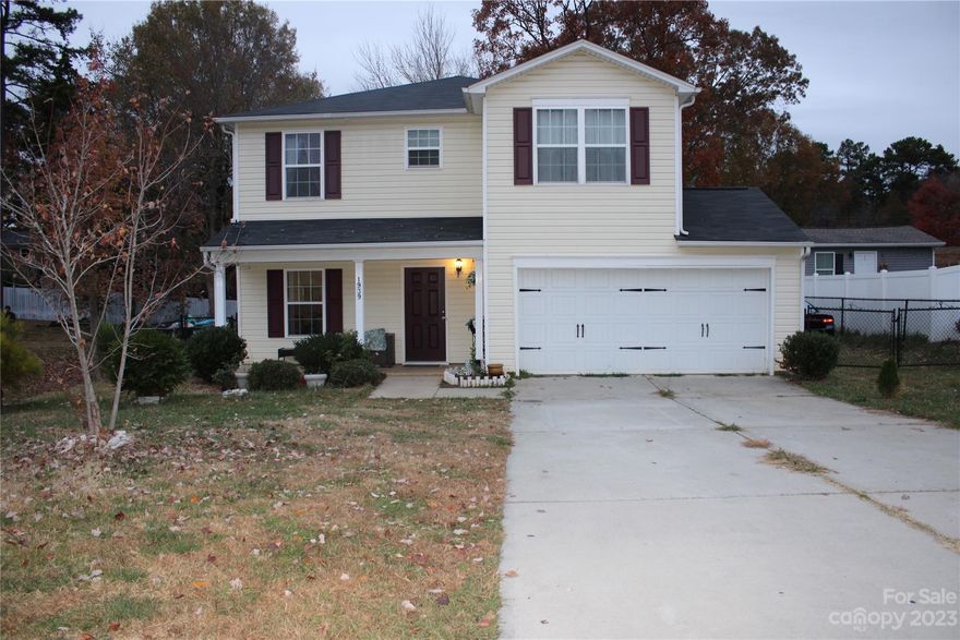 Welcome Home to this beautiful, well-maintained 4-bedroom, 2.5 bathroom home located minutes from Highway 74. The main Level of this beautiful home features a formal Dining Room, Kitchen with quartz counters, tile backsplash, white cabinets which opens up to the family room. Upstairs, you'll find the HUGE primary bedroom providing an ensuite bathroom with dual sink vanity, bath tub, and large walk-in closet with shelving. Three additional bedrooms with a full bathroom. Many updates throughout including new Luxury Vinyl plank flooring on both levels. Enormous flat yard awaits you & offers plenty of space for kids and/or pets. This beautiful home has been impeccably kept inside and out and is move-in ready. There is NO HOA associated with this neighborhood. Make this home yours before Christmas!