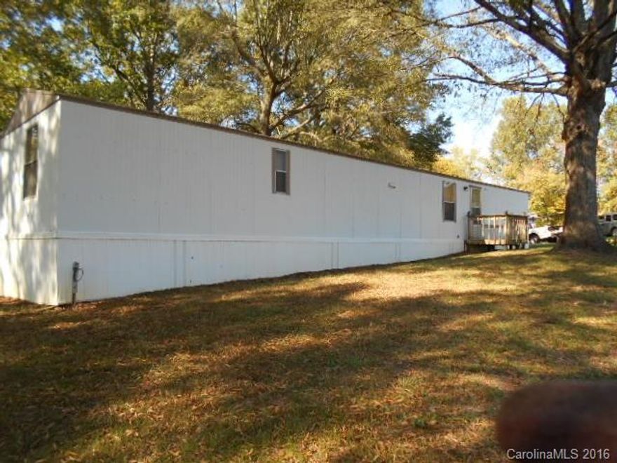 WE INVITE YOU TO COME SEE THIS NICE single-wide manufactured home placed on 2.74+/- acres.  Split bedrooms/bathrooms.  No city taxes and no home owners association fees to pay.  No water or sewer bills to pay either.  Water supply is private well.  Couple of out buildings on the property for storage or for your workshop. Lots of nice trees on the property.   Call today for an appointment to look at the property and to begin the process to make it your new home in the country.