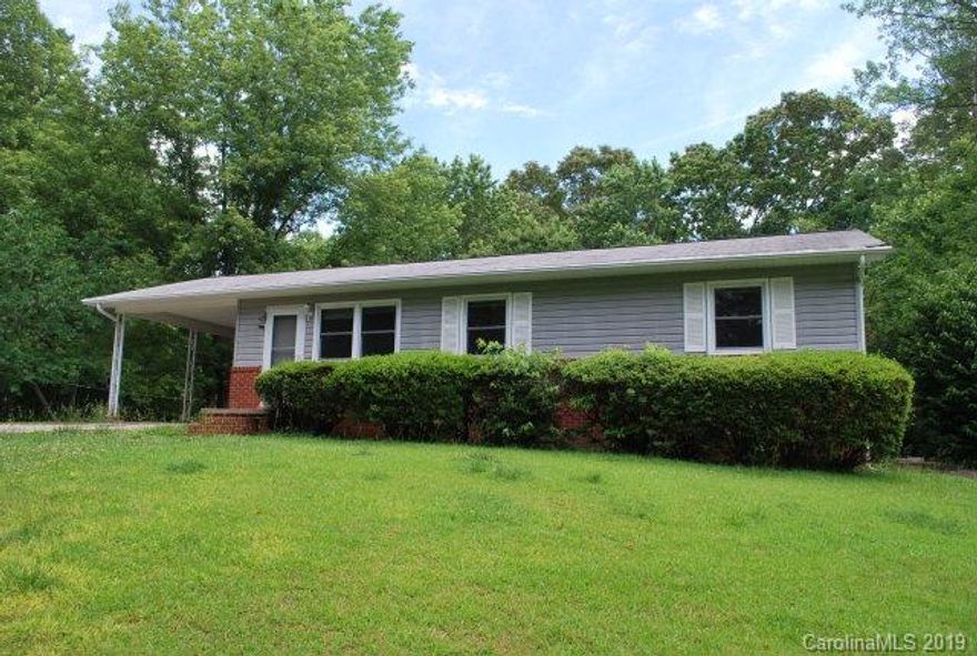 Pleasant Gardens area-3 bedroom, 1 bath brick & vinyl home.. This home features hardwood floors, sheetrock, thermo-pane windows, new pvc plumbing, heat pump, along with a carport.  In addition there is a  72 x 14 2 bedroom 2 bath singlewide that has been a long term rental.  These homes have individual septic systems and share a well.  This would make a great income property using both as rentals or as a personal residence along with a rental property.