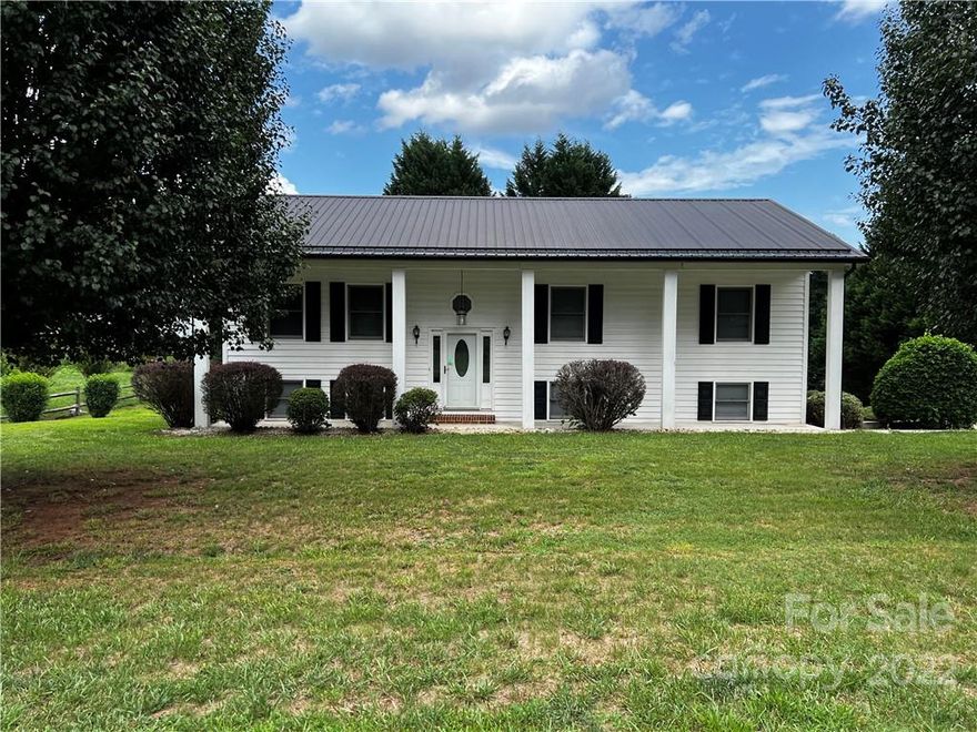 DUDLEY SHOALS AREA! Welcome home to this inviting 3 bedroom, 2 bath brick home. You will love that all the work has already been completed & the home is move-in ready. A spacious open floor plan is desirable and functional. Kitchen is equipped with a range, refrigerator, dishwasher & and an island for quick meals. There is also a dining area for more formal meals--and a deck just off the kitchen to over look the kids playing in the back yard. A fireplace insert with gas logs makes for a cozy living room. Three bedrooms, 2 baths are down the hall. Laminate wood floors throughout the entire main level. Downstairs is a newly finished den that could be used for entertainment, exercise or an additional bedroom. The garage is also in the basement, plus a carport for more covered parking. Nice level, corner lot with lots of landscaping and shrubbery. Convenient to HWY 321 and lake.