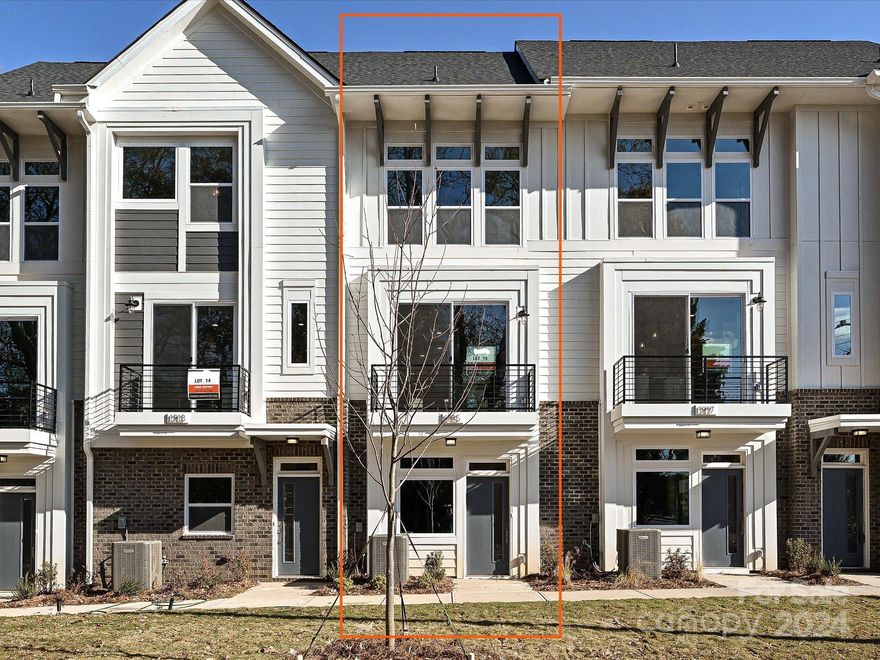 Seller-paid 4.99% 30-year fixed mortgage incentive w/ preferred lender – contact agent for details. 4-story NoDa townhome w/ 9' ceilings, 2-car tandem garage & 4th floor ideal for entertaining, guest space, or a home office, with a Rec rm w/ closet plus large rooftop terrace w/ TREX decking. Small terrace located off the kitchen. All kitchen & laundry appliances are included, & 3 ceiling fans. Kitchen has 42" light grey painted cabinets w/ trash pullout, under-cab lights, quartz counters, tile backsplash, large SS undermount sink & GE SS appliances w/ gas range & French door fridge. 3rd floor laundry w/ GE stacked washer/dryer. Premier Bath w/ quartz counter, tile floor & shower w/ semi-frameless glass. Bath 2 has quartz counter & tile floor. Low maintenance LVP flooring at the garage entry, throughout the 2nd floor, plus 3rd floor landing & laundry. Stairs have oak treads plus straight black wrought iron balusters for a modern look. Only 3 miles from Uptown Charlotte.