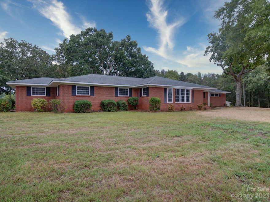 Welcome Home to 893 Wolf Pond Church Rd!  Up to $3,500 in seller concessions with approved lender.  This 3 bedroom, two bath, all brick, ranch home sits on three acres near the NC/SC state line.  With an attached two car garage and detached 3 car garage/shop this home offers endless possibilities. Home is move-in ready with fresh paint throughout, new LVP, new carpet, granite, new stainless steel kitchen appliances, new lighting fixtures, and hardware.  Call today for your showing!