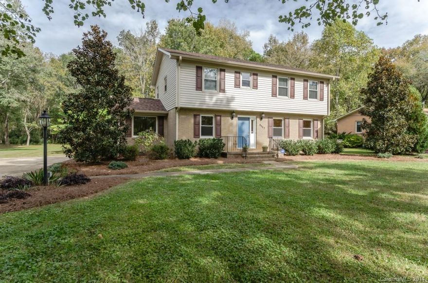 FANTASTIC Opportunity! Beautiful, heavily-wooded property with in-ground swimming pool & expansive patio area & private yard. The entire home has been updated. Granite tops in kitchen, new faucet, SS appliances. Updated lighting throughout. Master bath has large tiled walk-in shower, tiled floors, new vanity, toilet & fixtures. Hall bath is all new as well. Beautiful original hardwoods & bamboo flooring. New paint throughout. ROOF in 2011. New siding. 18x24 Wired Garage/Workshop. MUST SEE!