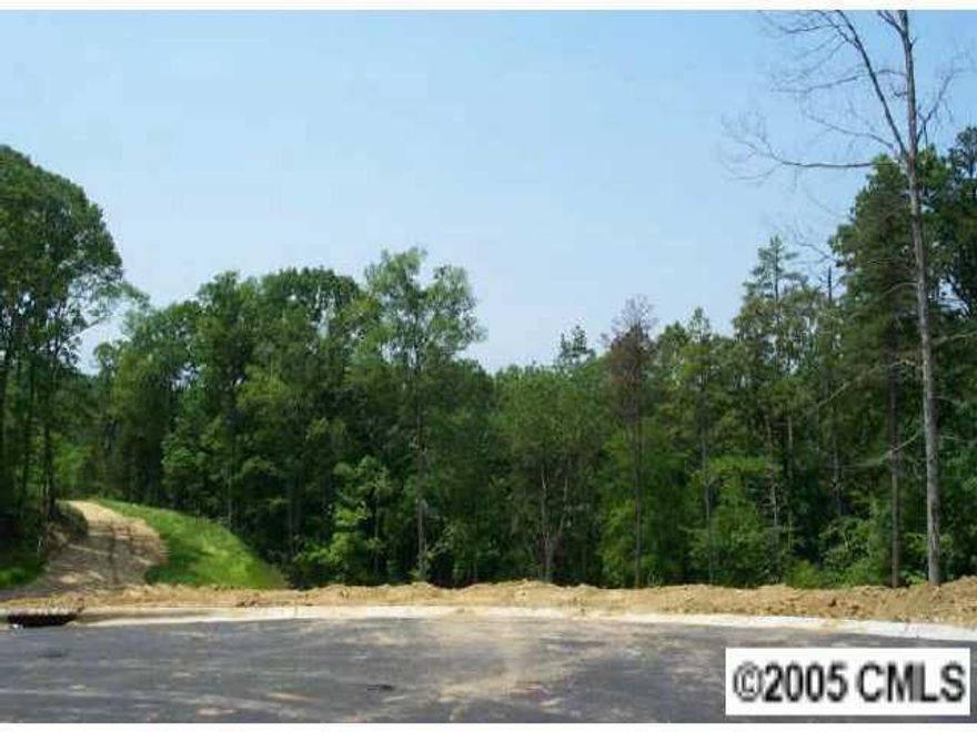 Wooded homesite in custom section (LeParc)of community in desirable Harrisburg.  Low taxes - close to schools -  Minimum Square Feet Requirements:  2600 - 1/Story.  2800 - 1.5/Story.  3000 - 2/Story.