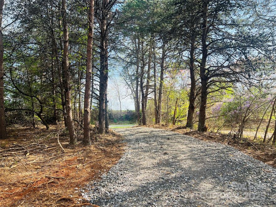 Nice unrestricted lot located in Hamptonville. Hamptonville is known for it's peaceful rural lifestyle with easy access to urban amenities and it's known for wineries, vineyards, farms and specialty shops, particularly it's agricultural heritage and attractions like Shiloh General Store and Swan Creek Farm. Plat and soil analysis have been completed. Per zoning ordinance, may have up to 3 manufactured homes on a single parcel. Minimum size and development standards may also apply. Dwellings must comply with all applicable requirements of the RA district. See section 111-338 of the zoning ordinance.