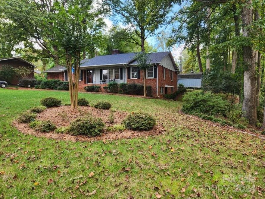 Beautiful well maintained brick ranch with basement.  Hardwood floors, sparkling clean kitchen, sun porch with the home sitting on a large lot. Third bedroom and bathroom on basement level with exterior exit.