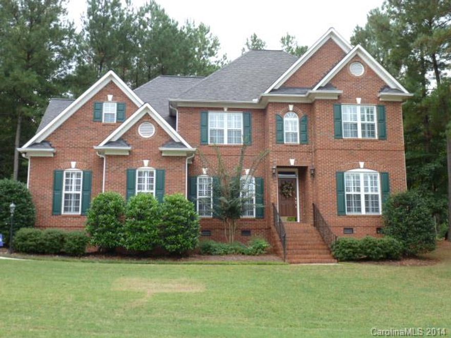 Beautiful Custom built home, all brick, located in Forest Hills Subdivision. This home is move in ready has all the extras for the new or growing family. Main floor has beautiful hardwoods throughout with formal dining, office or bedroom, great room with fireplace opens to sunroom. The kitchen is fully equipped with work island custom cabinets and oak trim counter tops and pantry. Oversized laundry room with half bath.