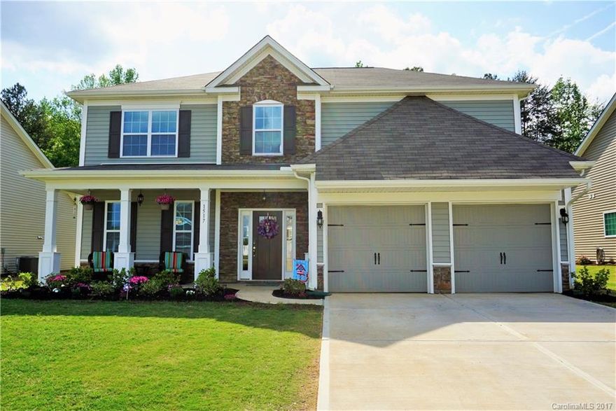 Do NOT Miss This One! Less Than 1 Year Old. Move Right In! Hardwoods On The Main, Granite Kitchen & Granite Island, Custom Tile Backsplash, Gas Range/Oven, Walk-In Pantry, Guest Bedroom & Full Bath On Main, Large Laundry Room On Main, Upper Super-Sized Bonus Room/5th Bedroom, Generous Master Suite w/Granite Dual Vanity Bath + Large Walk-In Closet. Entertaining Paver Patio With BBQ Grill Set Up - Wooded Back Yard View Just Does Not Get Any Better. Premium Community Lot! Do NOT Wait On This One!