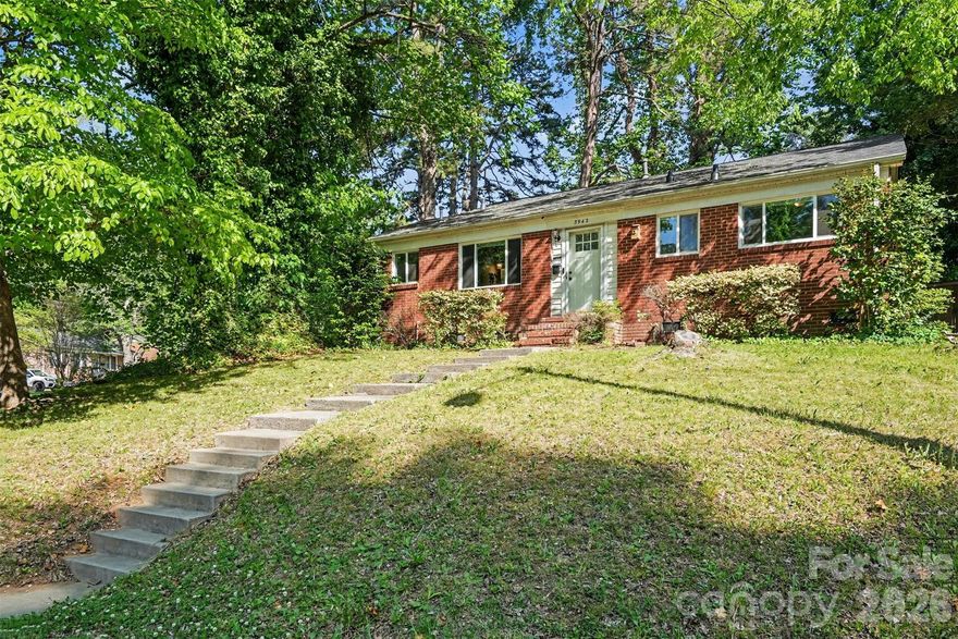 Located in the highly desirable Shamrock Hills neighborhood, this move-in-ready all-brick ranch sits on a spacious corner lot and is packed with upgrades buyers are searching for! Featuring beautiful hardwood flooring throughout with tile in the kitchen and bath, this home blends classic charm with modern updates. The renovated kitchen offers white cabinetry, granite countertops, and a mix of black and stainless steel appliances for a stylish, functional space.

Major system updates provide peace of mind, including new electrical and plumbing (2021), a whole-house water filtration system (2021), a tankless water heater (2021), new windows (2021), an HVAC system (2017), and a brand-new roof installed in 2024. Enjoy outdoor living with a backyard storage shed ideal for gardening tools, hobbies, or additional storage.

Conveniently located near Plaza Midwood, NoDa, Uptown Charlotte, dining, shopping, and entertainment, this beautifully updated ranch offers the perfect combination of location, character, and modern efficiency. Don’t miss your opportunity to own a turnkey home in one of Charlotte’s most sought-after areas—schedule your showing today!