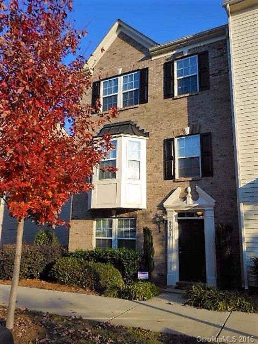 Fantastic 3 story townhome in heart of Ayrsley Town Center.  Entry level has living room/office space and half bath.  Main level has kitchen with granite counter tops, breakfast bar, stainless steel appliances (side by side refrigerator, convection microwave and dishwasher), family room with gas log fireplace, dining room and half bath.  Large master suite upstairs features private bath with garden tub, dual vanities and walk in closet.  Two additional guest rooms. Second story deck.