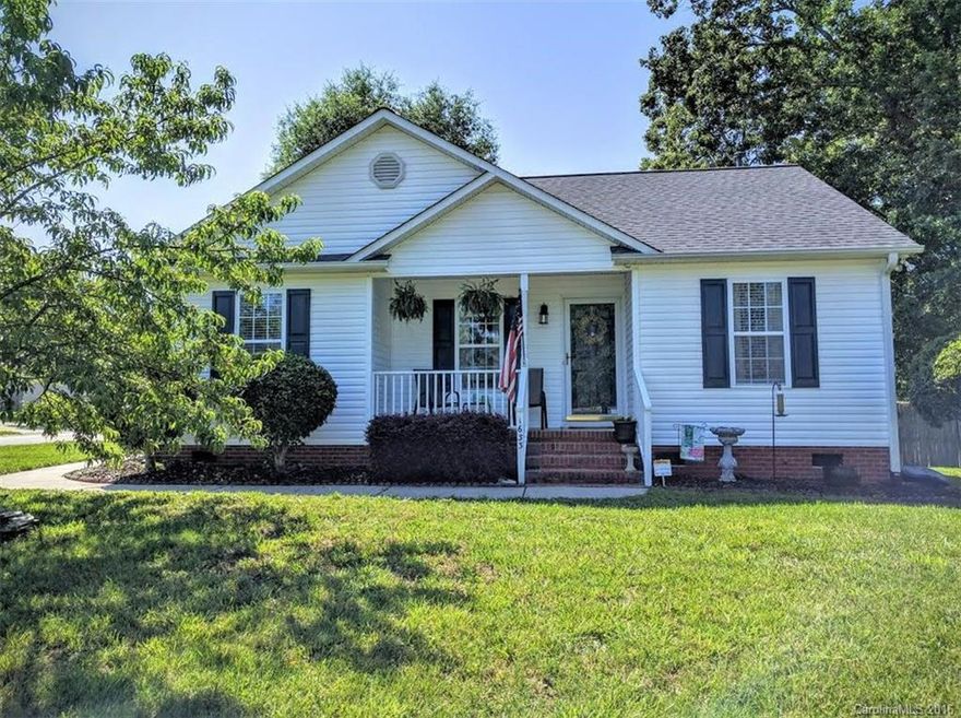 Cute as can be! Immaculate, open and spacious three bedroom two bath home. Vaulted ceilings, laminate flooring, split bedroom floor plan. Bright and sunny kitchen with breakfast area. Fenced backyard on a corner lot. Hurry! This one will sell fast.