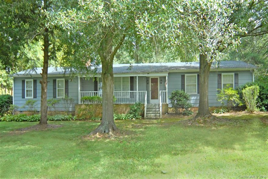 Charming home in private wooded setting. Lots of peace and quiet. Large Family Room with fireplace. Granite countertops in large family kitchen with breakfast bar. Bright Sunroom with ceiling fan.  Beautiful custom water feature in backyard. Private guest house with 2 bedrooms and 1 bath also located on property. Low Gaston County taxes.