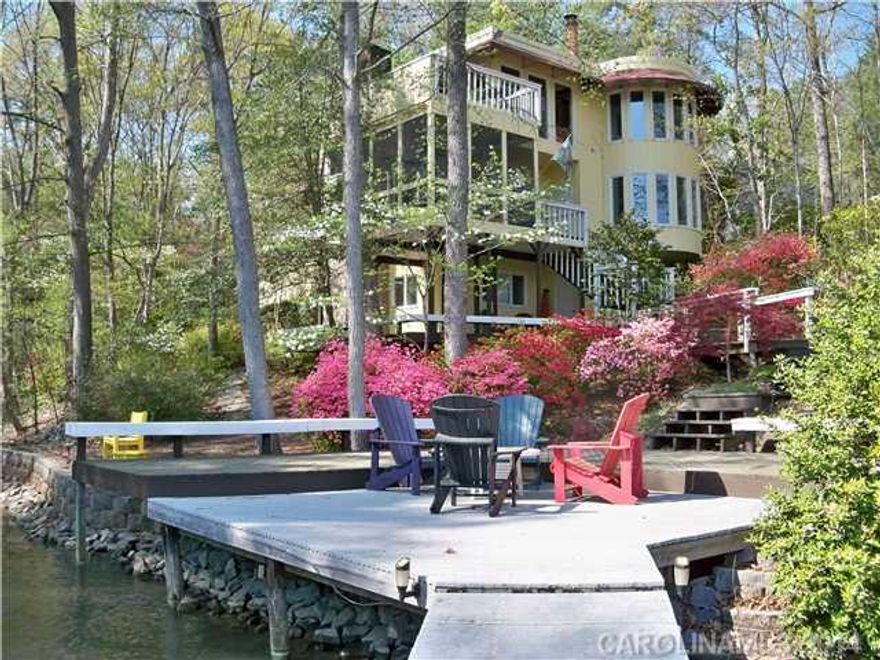 WHO KNEW?  Delightful, bright, Hide-a way tucked away peacefully in a private deep water cove, This nautical theme home has it all & features new HWs,updated kitchen,Mbath,low maintenance wooded WF lot. Awesome water views from most all rooms. Enjoy the River Hills lifestyle in this beauiful gated community.
