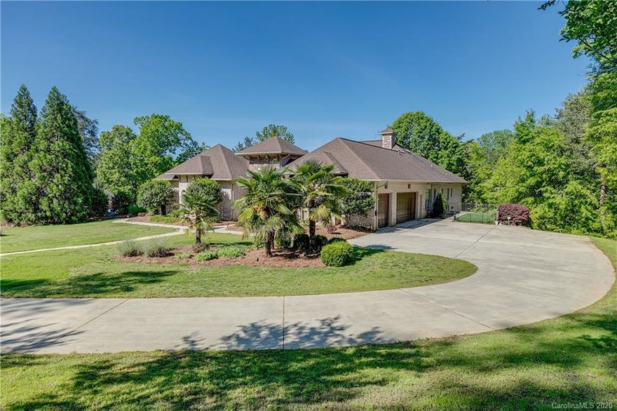 Look at this value!! Get this gorgeous waterfront home on 2.70 acres for under $169.00 sq ft when builders are charging $200 plus per sq ft WITHOUT any land! This full brick with stone accents home is built around an in-ground pool/ court yard / outdoor kitchen with attached quest cabana.  Spacious floor plan with tons of open area. Huge granite kitchen island for the family to gather or perfect for entertaining large parties. Hard to find 2nd Living Quarters with it's own garage space that is handicapped accessible!  Screened in Porch off the main floor over looks the lake. Billiard, Exercise and Media room in Basement! Short walk to floating dock/ boat slip with an stationary seating area over the lake.  Large lot offers tons of privacy with an abundance of wildlife.  Wonderful low SC taxes and award winning Clover schools.