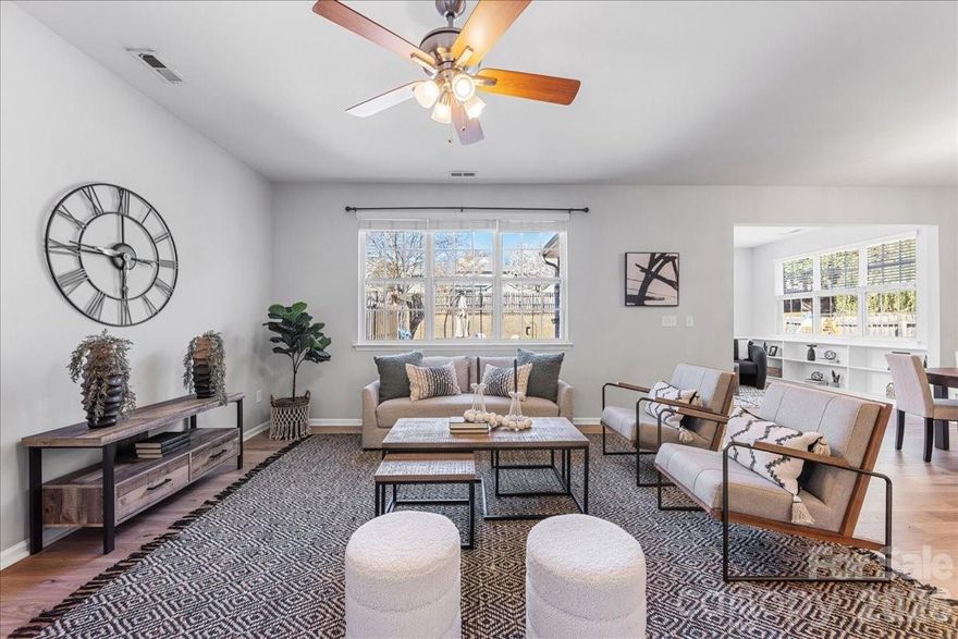 Back on the market with a brand new roof! Nestled in the highly sought-after Villages at Rosedale community, this 4-bedroom, 2.5 bathroom move-in ready home has been meticulously maintained and is ready for its new owners. Step inside to discover an open-concept floor plan, featuring brand new engineered hardwood floors (installed March 2026), fresh neutral paint, and an abundance of natural light. As you enter the front door, you’ll find a private enclosed office with glass French doors, ideal for working from home, along with both formal and informal dining spaces for effortless entertaining. The kitchen features beautiful painted cabinetry, updated appliances, and a custom walk-in pantry complete with an appliance tower and electrical outlets. Beyond the kitchen is a bright and versatile sunroom providing additional living space that can easily function as a sitting room, playroom, or flex space to suit your needs.

Upstairs, the generously sized primary suite offers a relaxing retreat with an en suite bath featuring dual vanities, a soaking tub, and two closets. You’ll also find two additional spacious bedrooms, a large bonus room that can serve as a fourth bedroom, and a dedicated laundry room for added convenience.

Outdoor living is just as impressive, with a patio, custom fire pit area, and a playground featuring rubber mulch for added safety creating the perfect setting for relaxation and play. 

This vibrant community offers exceptional amenities, including a pool, playground, Rosedale Nature Park, and direct access to the Greenway. Enjoy being just minutes from the shops and dining at Rosedale Shopping Center. Welcome home!