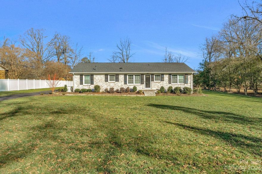 Coming soon!  Full brick ranch on 0.66 acre with NO HOA located close to The Stallings Municipal Park.  Updated home with open floor plan kitchen, dining room and family room.  Newer white kitchen cabinets with back splash and granite countertops. Kitchen island with granite countertops.  Stainless appliances: range, refrigerator, dishwasher and microwave. Seller leaving another refrigerator and washer and dryer.  Prefinished wood floors and tile; no carpet.  Two full baths and 3 bedrooms. Wall mounted tvs in family room and primary bedroom will remain.  Detached 2 car wired garage with concrete floor.  Asphalt driveway with asphalt extended beside both sides of the garage and in front of it. Generac 22kw generator that runs the entire home. Roof, water heater and heat/air unit replaced in 2019.  The crawl space has a sump pump and vapor barrier. Attached covered one car carport that can be used as a porch or carport. Walk to the park and downtown businesses in Stallings. Termite bond.