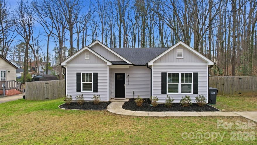 Move in ready home situated on just over an acre in Charlotte offering rare combination of space, privacy, and convenience all in one.  This thoughtfully designed home showcases an open concept floorplan anchored by a beautifully appointed kitchen featuring stainless steel appliances, Carrara marble countertops, timeless subway tile backsplash, and 42” shaker style soft close cabinetry. Both bathrooms are enhanced with marble top vanities and elegant ceramic tile surrounds. Ideally located just minutes from Uptown Charlotte, offering easy access to major highways, upscale dining, shopping, and entertainment.  Enjoy exploring nearby parks, greenways, local breweries, and take advantage of everything Charlotte has to offer, all while coming home to the comfort of your own peaceful retreat.