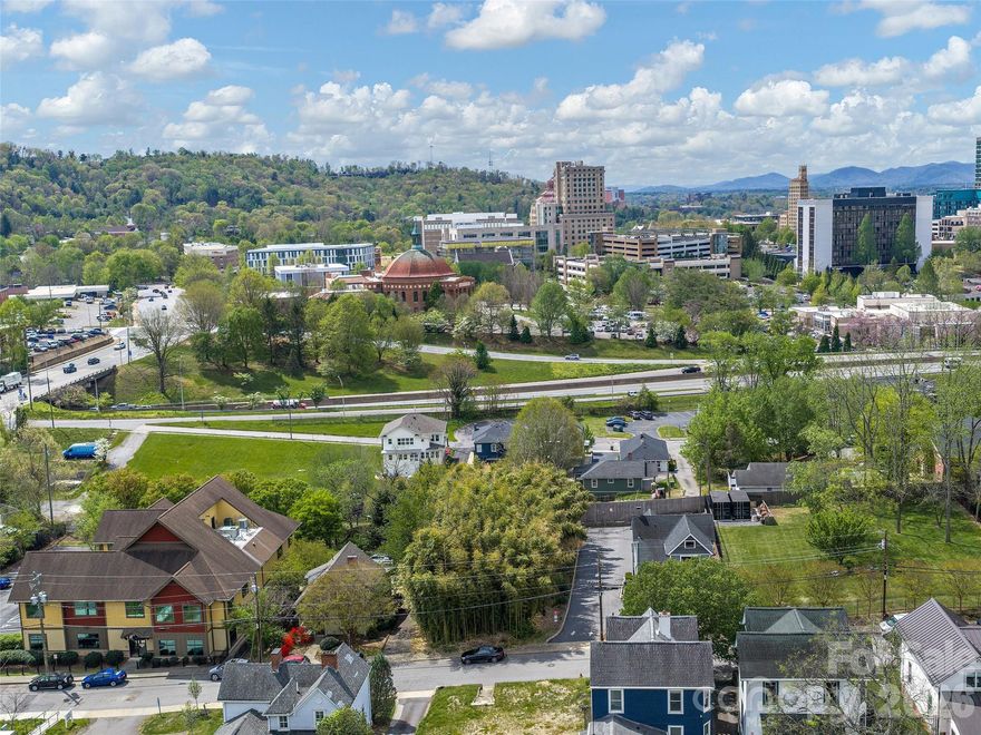 .21 acre building lot zoned commercial, however this lot can be used for office space, single family, multi-family or duplex.