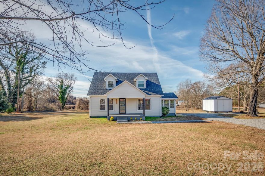 BACK ON MARKET - NO FAULT OF SELLERS & PRICED BELOW APPRAISED VALUE!!!  Every house tells a story and the story of this quaint farmhouse is worth retelling.  Built post-Depression, this circa 1938 "minimal traditional" style home was practical, compact & no-nonsense.  Vegetable gardens surrounded the home w/various farm animals kept on the back of the property.  The kitchen bustled with activity and was the family's gathering place every Sunday for dinner.  As time moved on, the property transferred to family members & become a rental property.  Fast forward to a FSBO sign in the yard and we knew we had to buy it.  Our goal - transform this adorable home situated on 2.75 acres of level, unrestricted land into a property that could once again be the beloved home for a small homestead, hobby farm, or just folks looking for a little elbow room.  The kitchen is totally updated w/flat panel white cabinets, stainless appliances, quartz counters, & subway tile backsplash.  Mudroom laundry enclosed w/new windows & electric wall heater to add heated living area.  Hexagon tile flooring in both baths w/updated vanities.  Current light fixtures, brand new HVAC & new drainfield for 3 bedroom septic.  Original hardwood floors refinished w/Duravana hybrid resilient flooring elsewhere.  Roof is like new & 10x12 outbuilding w/6' door just delivered!  This home is spacious and MOVE-IN READY plus potential opportunity to subdivide for an adjacent building lot.  NOTE:  Agent is owner & one bedroom does not have a closet.