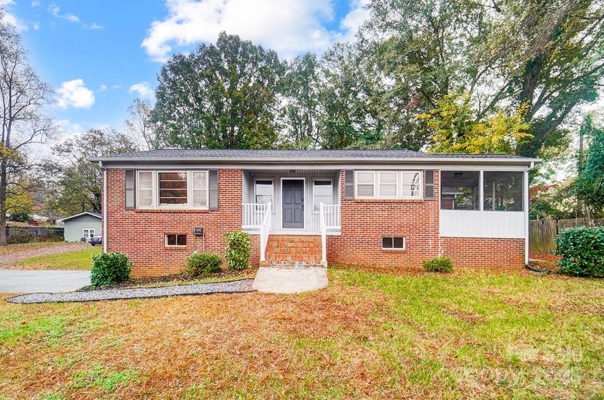 Welcome to this spacious, move-in ready, full-brick ranch w/ basement situated on 0.65 acres! 4 BR, 2.5 bath plan showcases over 2,050 SF of living space! Completely renovated & upgraded with new LVP flooring & carpet, fresh paint & modernized light fixtures. Eat-in kitchen highlights freshly painted white cabinets, granite countertops, new SS appliances & sleek black hardware. Baths have been tastefully updated to include new vanities, countertops, lighting & hardware— Primary ensuite complete with tile shower! Downstairs, find a HUGE basement w/ 1 car garage & privately situated 4th BR & half bath. Perfect space for entertaining... Home theatre or game room with pool table— The options are endless! Two laundry rooms-- On main level & in basement for convenience. Living space extends outdoors to the covered, screened porch! Enjoy this quiet, private lifestyle while conveniently located minutes to Atrium Health Lincoln, Hwy 321 & downtown Lincolnton— Easy commute to downtown Charlotte!