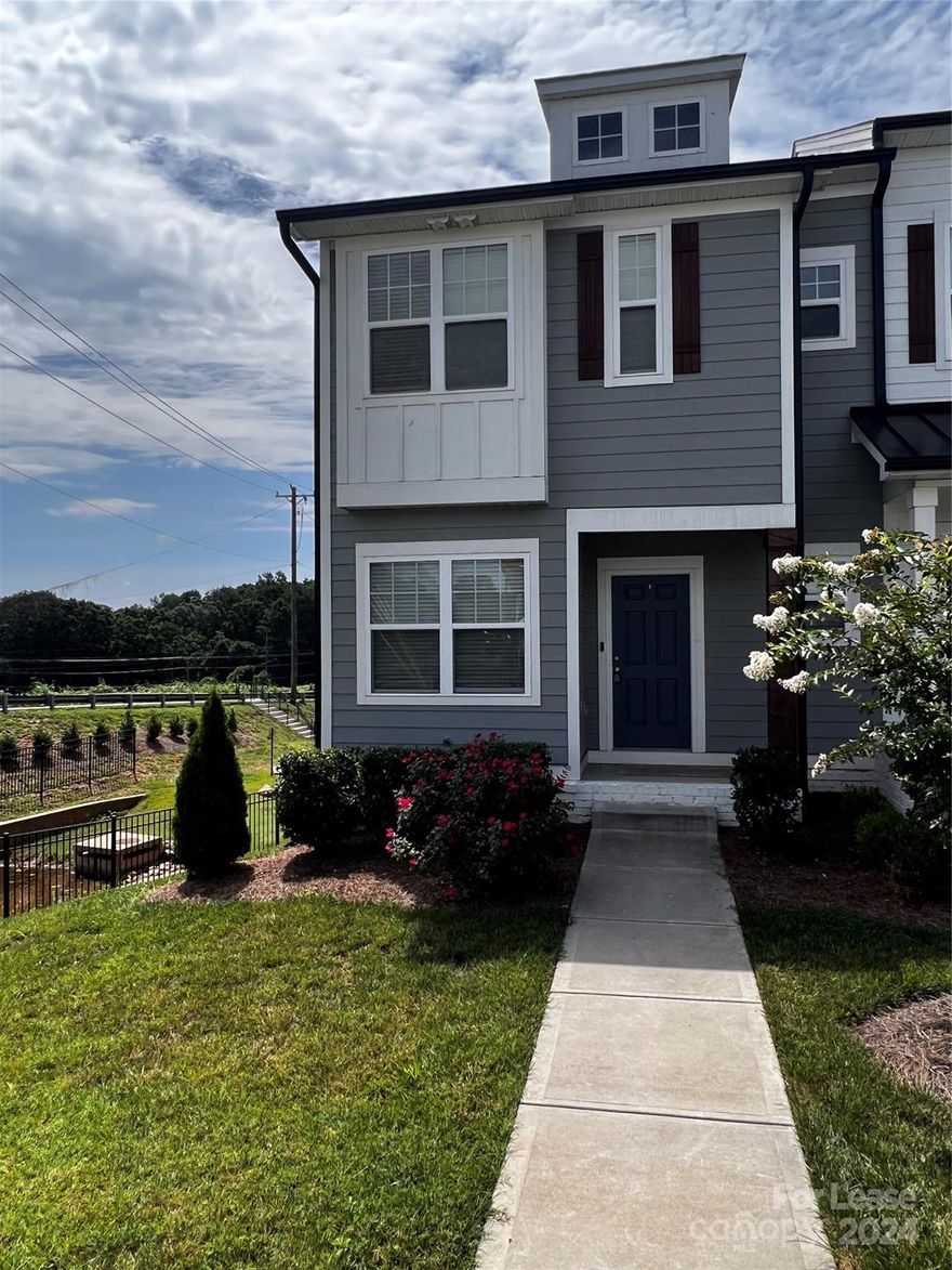 Delightful farmhouse style townhome just minutes away from Downtown Belmont. Laminate wood flooring throughout main level. Kitchen has white soft close cabinets, granite countertops and all stainless steel appliances. Dining area is enhanced by wall molding panels and view off the balcony. Spacious primary bathroom with walk-in closet and private bath featuring dual sinks and walk-in shower. Two comfortable secondary bedroom and additional full bath on upper level as well. Huge basement with ample room for two cars and storage on lower level. Charm, convenience and location!