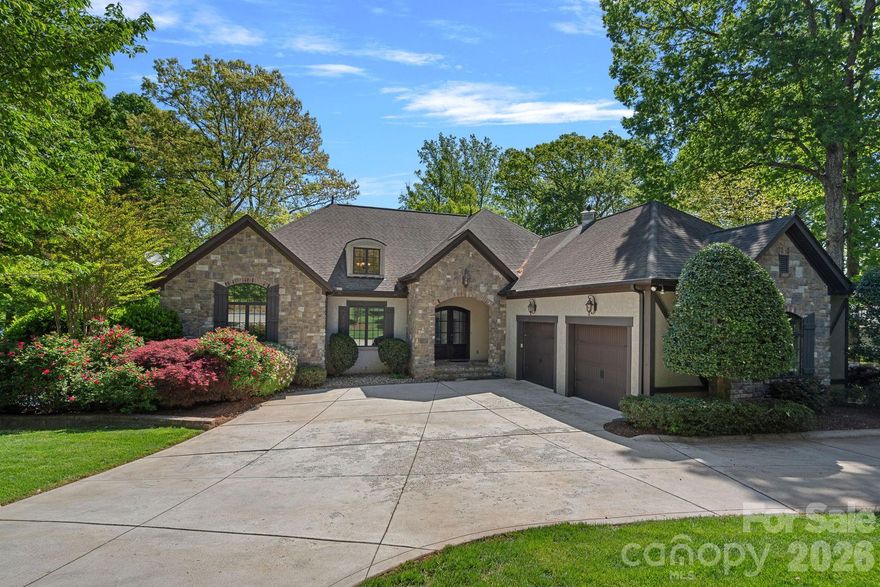 Beautiful, waterfront home with over 106' of shoreline, situated on a tranquil deepwater cove. Open-concept living leads you to a large wrap-around covered balcony equipped with ceiling fans for added outdoor comfort; or take a dip & soak up the sun in the peaceful infinity pool with hot tub overlooking Lake Norman. Enjoy meal-prep in the gourmet, eat-in kitchen with double-oven, gas cooktop, & lake views, open to the family room with gas fireplace. Retreat to the main level primary suite featuring balcony access & a large ensuite with garden tub. A guest bedroom, huge laundry room, mud room, den/office complete the main level. The Lower level features a second primary suite & additional guest bedroom, bonus room, second laundry room, custom-built bar, & flex room! Also featuring a lake-level garage off the basement, perfect for lake toys and/or yard tools. Newly painted interior (walls/trim/windows), new kitchen countertops. An impressive lake-front home where you can live/work/play!