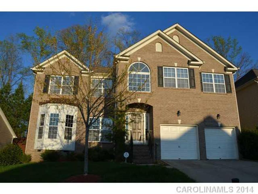 Desired location & schools in Cabarrus County section of Highland Creek called "Dominion Crossing."  Foyer with hardwood flooring,formal LR, DR with trey ceiling, kitchen with cherry stained maple cabinets, solid surface countertops, breakfast area open to Great Room with gas log fireplace. Main level guest suite with full bath.  Master Bedroom upstairs with spacious master bath and his & her closets.  Bonus room with closets. Deck overlooking private back yard!  HOME WARRANTY!