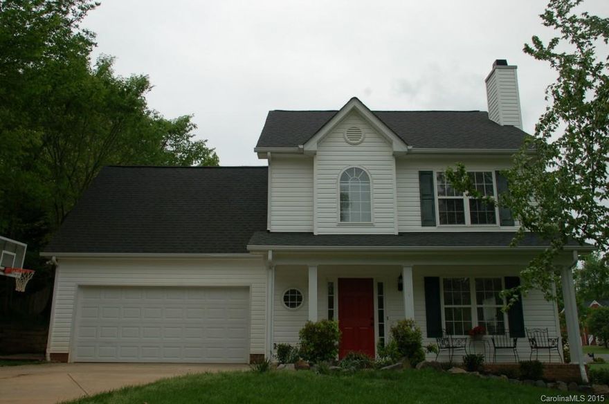 Charming Colonial Style 2-story home with Rocking Chair Front Porch on corner lot! Just Minutes From Downtown Waxhaw in fabulous Hermitage Place Subdivision! 4 Bedrooms/2.5 Bathrooms, Bamboo Floors on main, Crown Molding, Wainscoting, Chair Rail, Custom Neutral Paint, Blinds on all Windows, New Carpet, SS Appliances, Granite Counter Tops, Cherry Cabinets, Rolling Island, Master Suite and Huge Bonus Room Upstairs. Patio. Wireless thermostat, Security System, no HOA, Home Warranty!