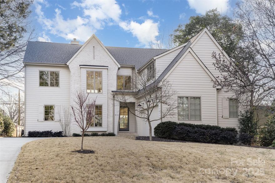 Stunning, light-drenched Mills Eloge home built in 2021, but still feels brand new. White oak flooring, floating staircase, high ceilings, large windows, custom high-end finishes throughout. Chef's kitchen with custom cabinetry, quartz countertops, expansive island, SS appliances, large scullery w/ dual-zone beverage fridge. Main level owner's suite w/ expansive bathroom (dual vanities, deep soaking tub, frameless oversized glass shower w/ dual shower heads) and massive walk-in closet (custom cabinetry incl island of drawers and secondary laundry hook up).  Outside boasts front motor court, 2-car garage w/ EV-charger, and a low maintenance zoysia front lawn. Private back yard is fenced-in w/ low-maintenance turfed lawn and built-in fire pit. Enjoy indoor-outdoor living on covered porch w/ motorized retractable screens. Prime location to restaurants, breweries, shops and walking distance of SouthEnd and the light rail. Minutes from Dilworth, LoSo, Uptown and I-77. **See virtual tour**