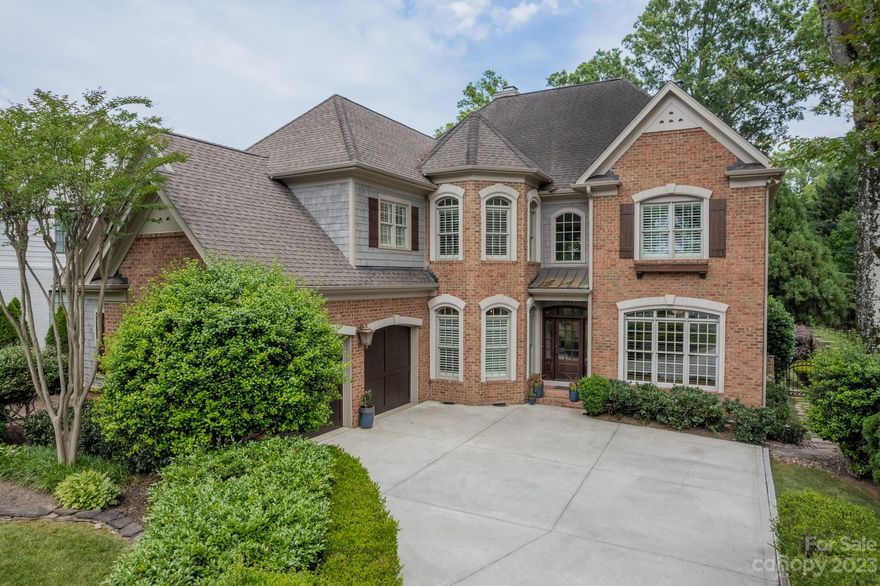 Beautiful custom home in the heart of Myers Park! Welcoming two story foyer, tall ceilings, beautiful, light oak floors, custom moldings, and abundant natural light throughout. Family room features custom built- ins, a see through gas fireplace, and floor to ceiling windows. Front dining room is adjacent to the kitchen, which includes an island, double ovens, cooktop, and a walk in pantry. Walk out from the sunroom to the very private back yard. Outdoor fire-pit, wood burning fireplace, built in grilling station, and beautiful patio make this space perfect for entertaining or a quiet dinner. Guest suite and separate office/living room are all on the first floor. Primary bedroom includes a sitting area, separate walk-in closets, double vanities, large whirlpool tub, and walk-in shower with rain head. 3 add'l, generously sized bedrooms, laundry room and bonus/media room upstairs.  Minutes to Freedom park, the greenway, restaurants and retail!