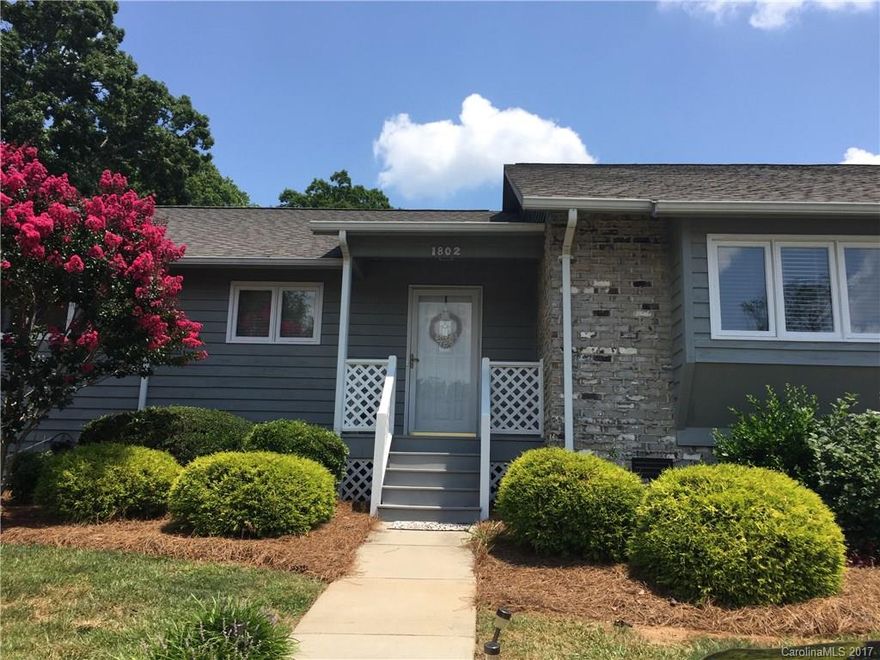 Beautiful condo in popular Wellington Hills in immaculate condition.  Loaded with updates and move-in ready.  Open concept with updated light fixtures, ceiling fans, beautiful Pergo flooring, and 2" blinds throughout.  Also has a screened porch!  This home has a brand new heating/cooling system.  Wellington Hills is a lovely neighborhood in a great location.  Amenities include swimming pool and clubhouse.  Enjoy a maintenance-free lifestyle!