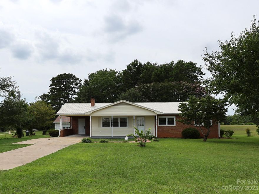 Welcome Home to Statesville! This move-in ready brick ranch home has over 1200 square feet of living space, including 3 bedrooms and 2 full bathrooms! As you step inside, you'll notice tons of upgrades throughout the home, including fresh paint, new doors, and updated fixtures. The hardwood floors have been refinished and shine bright as new! The charming kitchen makes cooking a breeze, with its new stainless-steel appliances, hardware, tile floors, and recessed lighting. The living room is ready to cozy on up, with recessed lighting, refreshed painted brick fireplace, and plenty of natural light with all the bright windows. Not only has the home been updated, but the electrical panels for both the house and the detached 3-car garage have been replaced, all new. The home is conveniently located near I-77 and I-40, making it easy to access various shopping centers, restaurants, and entertainment options. This is a wonderful home with many improvements that you're sure to enjoy!