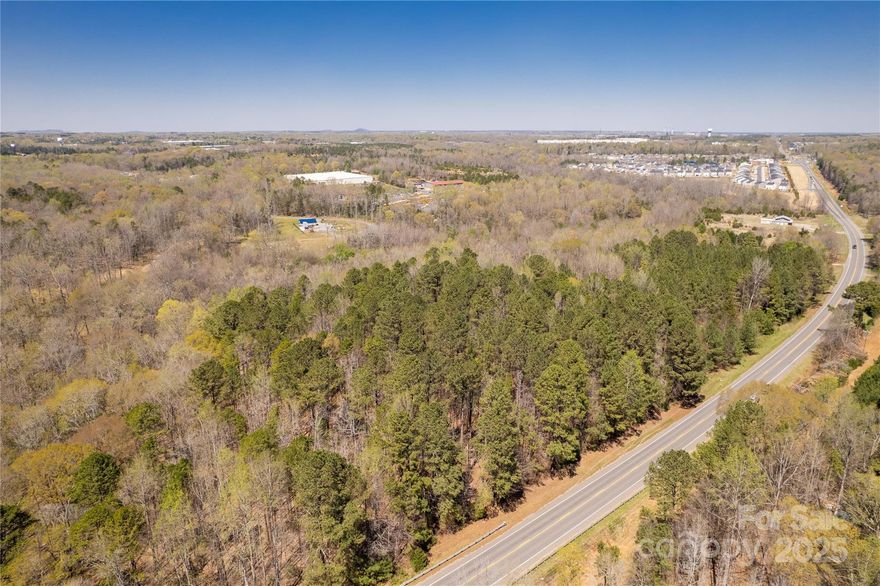 Beautiful piece of property (Over 16 acres) on HWY 21 N, 10 Minutes to Charlotte, close to I77, Fort Mill address, outside city limits. Property is currently zoned AGC and presents a wealth of opportunities!