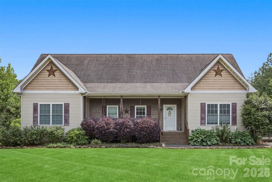 Imagine waking up to the sounds of nature, with 20+ acres of your own private paradise surrounding you. This inviting home offers 1900 square feet of comfortable living, featuring 4 bedrooms and 3 bathrooms. Picture yourself enjoying morning sunrises on the charming front porch, and hosting unforgettable barbecues on the expansive deck as the sun sets. This isn't just a house; it's a lifestyle. Come experience the tranquility and freedom that only country living can provide.