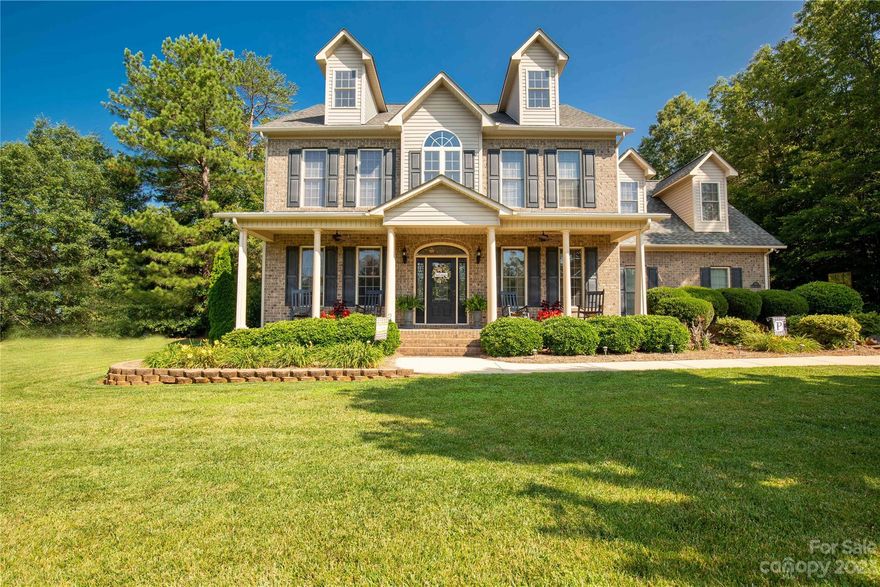 You simply cannot miss out on this pristine house! The gorgeous family room flows effortlessly into a spacious kitchen complete with an island, breakfast area, walk-in pantry, and butler's pantry, which also includes a wine cooler. On the main level, you'll find a large dining room, an office with a walk-in closet, and a mud room. As you make your way upstairs, you'll discover a grand primary suite, two additional secondary bedrooms, and a bonus room. The primary en-suite features a luxurious jetted tub and a custom walk-in tiled shower. This home also features an attached side-load two-car garage as well as a detached 24 x 30 garage with a finished living area above. Spend quality time with your loved ones on the charming rocking chair front porch or the spacious screened rear porch.