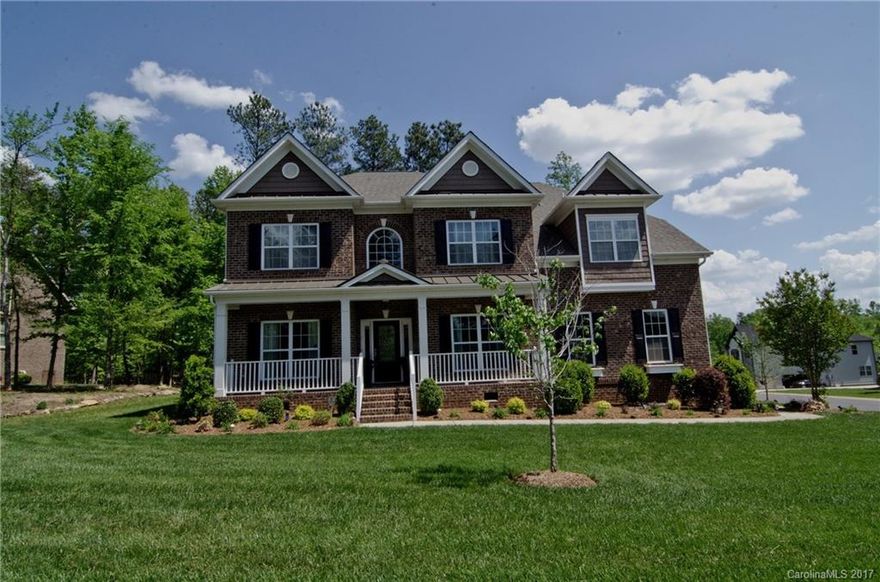 Semi custom home in the HEART of Lake Wylie on huge .70 acre lot in desirable neighborhood!Amenities include awesome clubhouse and pool, waterfront park, and now DOCKS! 4 bedrooms up and huge bonus, additional bedroom & bath suite on 1st floor, office,formal dining and GOURMET kitchen w counters for days! Awesome place for in ground pool/outdoor kitchen. Master suite is luxury w/sitting room.ALL THIS & IN AWARD WINNING CLOVER SCHOOL DISTRICT !