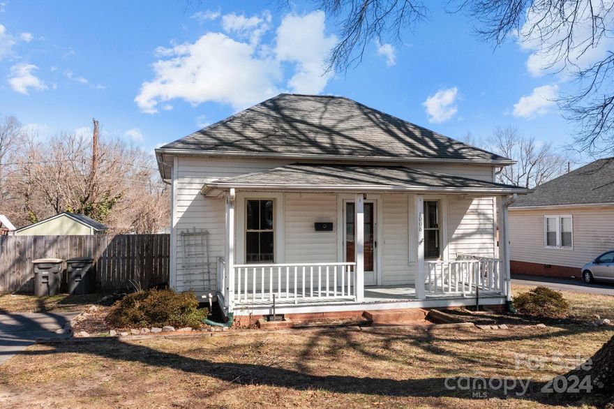 Walking up the front steps of this charming 2 bedroom, 1 bath home, you'll be immediately drawn by its spacious covered front porch.  Stepping inside, discover a thoughtfully designed space adorned with high decorated ceilings-adding a touch of the original elegance to each room.  The neutral palette throughout creates a canvas for your own personal style, allowing you to easily make this home your own.  Directly off the large kitchen is a dedicated laundry room, making your household tasks a breeze and adding convenience to your daily routine.  Outside, you'll find the perfect spot to entertain on the deck-in addition to a privacy fenced in back yard and handy storage building.  Home is conveniently situated near the Kannapolis Research Campus, Cannon Ballers Stadium, and all the ever growing local amenities, dining and entertainment going on in Kannapolis.  Seller is generously offering $5000 towards buyers discretion with acceptable offer.  Schedule your showing today!