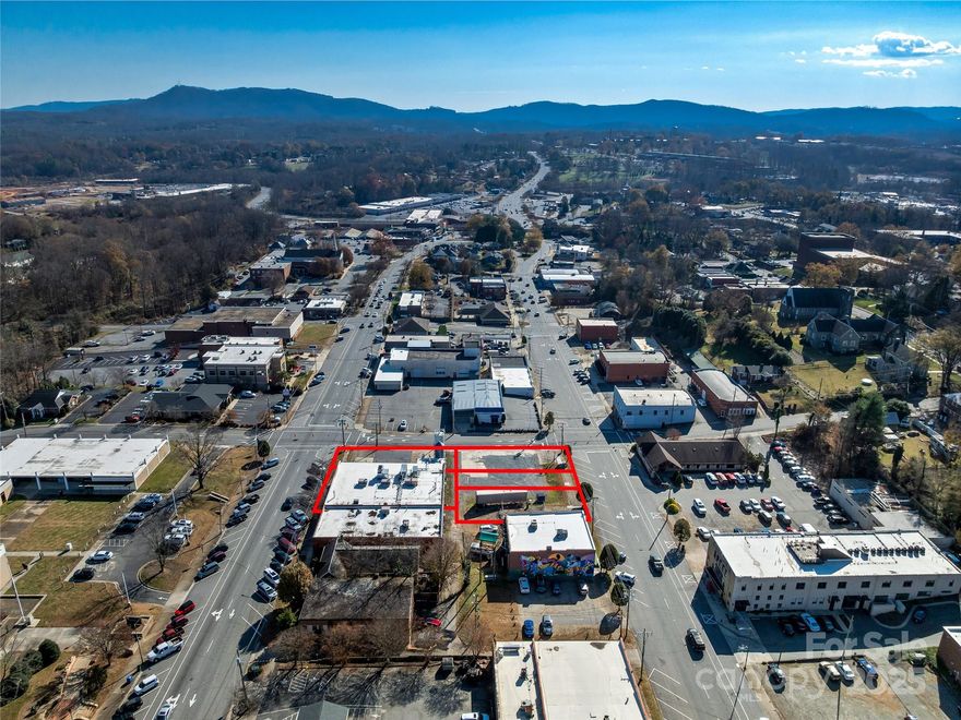 Prominent location and the chance to own a whole corner. Brewery opportunity for sale on five parcels totaling approximately 0.72 acres, zoned CBD in downtown Morganton, NC. This fully upfitted warehouse features a 30-barrel brewing system, tap room, and canning line, ready for immediate operation. Amenities include two restrooms with ADA-compliant stalls, 17' clear ceiling height (18' to insulation), a 17'×14' dock door, a 9'×9' dock door, a 7'×7' cooler, and four roof-mounted ethylene glycol chillers. Interior column spacing of 20' across by 22' deep (with some areas as close as 10') allows flexible production and storage layouts. The fully sprinklered building can accommodate up to 170 chairs or 110 tables and chairs — ideal for production, tap-room events, or future expansion. The property offers excellent regional access, just 1.8 miles from Exit 103 of I-40 in Morganton.