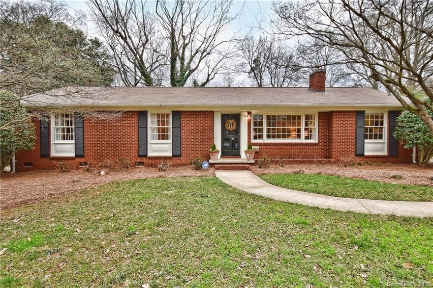 Charming brick ranch in sought after Country Club Heights! This stunning 3 BD/2 BA home has it all! Open floor plan, Gorgeous hardwood floors, Large updated KIT w/ granite, SS appliances & extended breakfast bar, Formal living rm w/ fireplace, Large Dining area, Den w/ built-in bookshelves, New roof (2014), Good storage, Walking distance to neighborhood park & school, Detached wired flex space (could be used for music/art studio; home office; storage). Large private yard w/ landscape lighting!