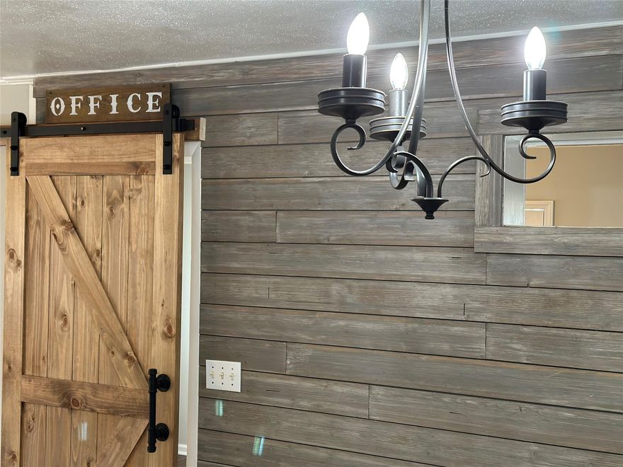 Really cute brick home on .31 acres of land!  Fenced in back yard with a big outbuilding (no real value-great for storage)! A large sunroom on the back of the house w/ large windows and shiplap!  A new large deck on the front of the house with a large front yard and mature trees!  Indoors includes hardwood floors throughout most of the living space including the bedrooms and tile in the kitchen. There is a really nice office/4th bedroom/laundry room with hand scraped bamboo floors & Barn door! White kitchen cabinets, tiled backsplash, shiplap accent wall and dining room in the kitchen!  Newer heat pump/central air, newer electricity and plumbing. Home was rented for several years. 3% down payment conventional loans available in lieu of FHA. Agent is the owner.Custom signs & decor can be included.This house is "move in ready"!  Ceilings and walls all new paint, new stain on the decks and fence! Low county taxes!