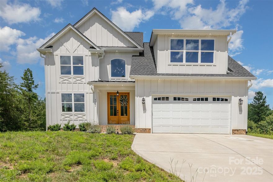 Discover the perfect blend of comfort, space, and small-town charm in this Clover retreat. Tucked away on over an acre, this home offers room to breathe, play, and entertain. Whether it’s backyard BBQs, cozy evenings under the stars, or morning coffee on the porch. Inside, the open flow invites connection, from the big kitchen with its island and coffered ceiling to the loft and bonus room ready for movie nights or game days. With the primary bedroom and laundry on the main floor, you never have to worry about going upstairs. Need quiet space? The dining room can easily become your private office. With 3 bedrooms, 2.5 baths, and a two-car garage, there’s room for everyone and everything you love. Here, life moves at your pace, close to Lake Wylie, just minutes from downtown Clover and York, and just far enough from the bustle to truly unwind.