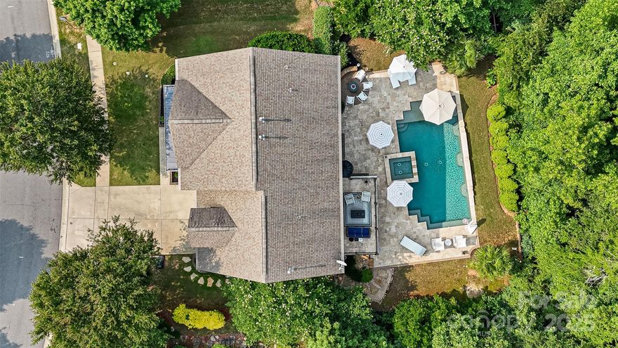 Welcome to your dream home in the highly sought-after Reserve at Gold Hill! This stunning 6BR/4BA home offers 3 spacious levels, including a finished basement, perfect for flexible living. The backyard is an entertainer’s paradise—featuring a custom saltwater pool with spa, full outdoor kitchen, and private tree-lined views. Inside, you’ll love the elegant custom trim, open layout, and room for everyone. Located in the award-winning Fort Mill School District and just down the street from top neighborhood amenities including a pool, airnasium, pickleball court, and playground. This is luxury living at its finest! *professional phots coming 6/3*