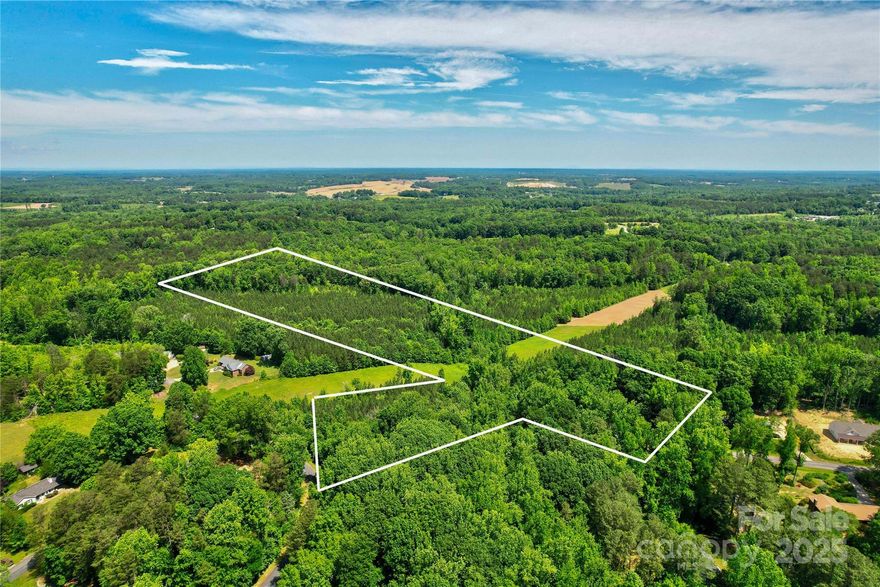 Prime Land Opportunity in West Rowan! This stunning 21+/- acre property offers endless possibilities! Featuring two parcels, it includes 3 acres (RS-zoned) off Catawba Rd and 18 acres (RA-zoned) with access through Greenleigh Subdivision. The land is wooded and part of the Rowan County Forestry Program, except for a 140-ft Transcontinental Pipeline R/W. Ideal for single-family homes, farming, or investment, this rare find provides ample space and privacy. Don’t miss this incredible opportunity—schedule your showing today!