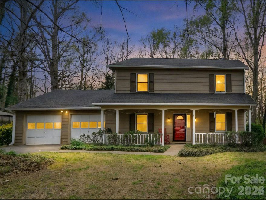 Welcome home to this beautifully maintained 3-bedroom, 2.5-bath retreat, perfectly tucked away just outside the Morganton city limits. Located on a quiet dead-end street in a well-established neighborhood, this home offers the peaceful setting you’ve been looking for with the convenience you need.  Imagine starting your mornings with a warm cup of coffee on the covered front porch, listening to the sounds of nature. In the evenings, unwind in your private, wooded backyard—complete with a fenced yard, above-ground pool, soothing fountain, fire pit, and a screened-in porch made for relaxing or gathering with friends and family under the Carolina sky. Inside, you’ll find a welcoming and comfortable layout featuring a blend of hardwood and tile flooring, a spacious living area anchored by a cozy electric fireplace, and a dedicated dining space perfect for everyday meals or special occasions. The kitchen shines with granite countertops and offers both style and functionality, while the main-level laundry adds everyday convenience. The spacious double garage with a workshop area provides room for hobbies, storage, or projects, giving you the flexibility to truly make this home your own. With recent updates including new gutters, pull-down attic steps, newer  pool liner and newer pump.  This home is move-in ready and waiting for its next chapter. Just minutes from downtown Morganton and I-40, you’ll enjoy easy access to local shops, restaurants, and community events—while still coming home to your own private escape.
