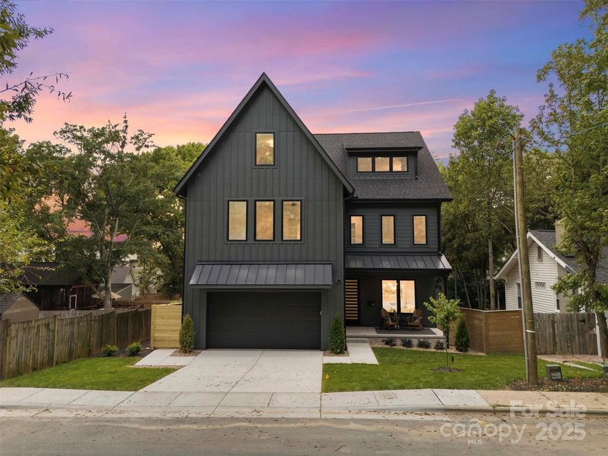 Gourmet kitchen: waterfall quartz island, butler’s pantry, and wet bar. Sliding glass doors out to Screened porch + TimberTech composite decking. Two-car garage with large utility closet, EV pre-wire, hot/cold hose bib, and oversized mudroom with storage.  Wide-plank hardwoods, designer lighting, bespoke features. Third-level bonus + kitchenette + terrace with an amazing skyline view. Private, fenced backyard (~0.17 ac). Conditioned crawlspace | Foam-insulated attic for comfort & efficiency. Walkable to Plaza Midwood/NODA cafés, breweries, greenway; ~8–10 min to Uptown.