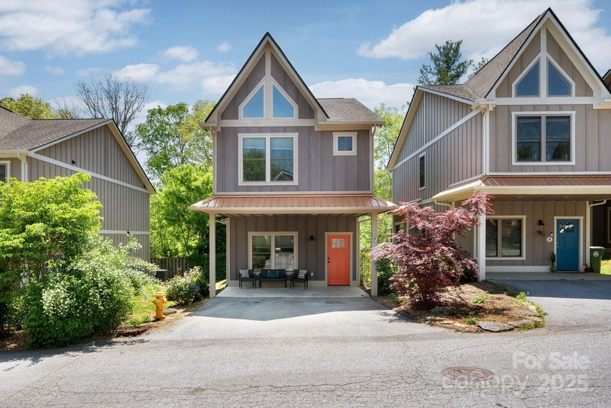 Tucked into a quiet cul-de-sac just steps from the energy of Haywood Road, this stylish cottage combines Arts and Crafts accents with the ease of everyday modern comforts—without the burden of HOA dues. Inside, sunlight pours through the open-concept main level, where 9-foot ceilings, warm wood floors, and clean, timeless finishes create a bright and welcoming feel. The kitchen features granite countertops, stainless appliances, and a central peninsula—ideal for casual cooking and conversation. Upstairs, the primary suite offers a peaceful retreat with its tongue-and-groove vaulted ceiling, walk-in closet, and private tiled bath. Two additional bedrooms provide flexibility for guests, remote work, or hobbies. Whether you're sipping coffee on the front porch or enjoying dinner on the back deck, this home blends character, convenience, and charm—no HOA dues, no hassle, just the right balance of style and connection in one of West Asheville’s most vibrant neighborhoods.