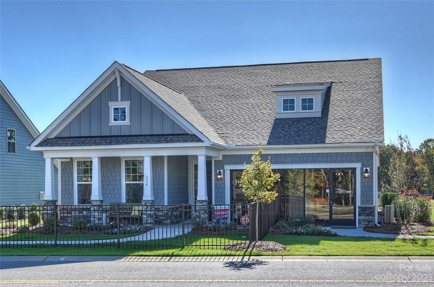 Welcome to this stunning Massey home! With great curb appeal & a covered front porch, this property is a true gem. As you step inside, you'll be greeted by decorative wainscoting & crown molding throughout, adding an elegant touch to the open floor plan. The great room features a cozy fireplace, perfect for gatherings & relaxation. The kitchen boasts an elegant design w/ an island, S/S appliances, wall oven, & gas cooktop. Storage is provided by the pantry, & the dining area is illuminated by a chandelier. Owners suite features a tray ceiling & walk-in closet. En-suite bath w/ a dual vanity & tiled walk-in shower. The main level is completed by secondary bedrooms, bath, & laundry room. Upstairs is a family room, along w/ a guest bedroom & full bath. Step outside to the back patio, where you can relax & enjoy outdoor living year-round.
