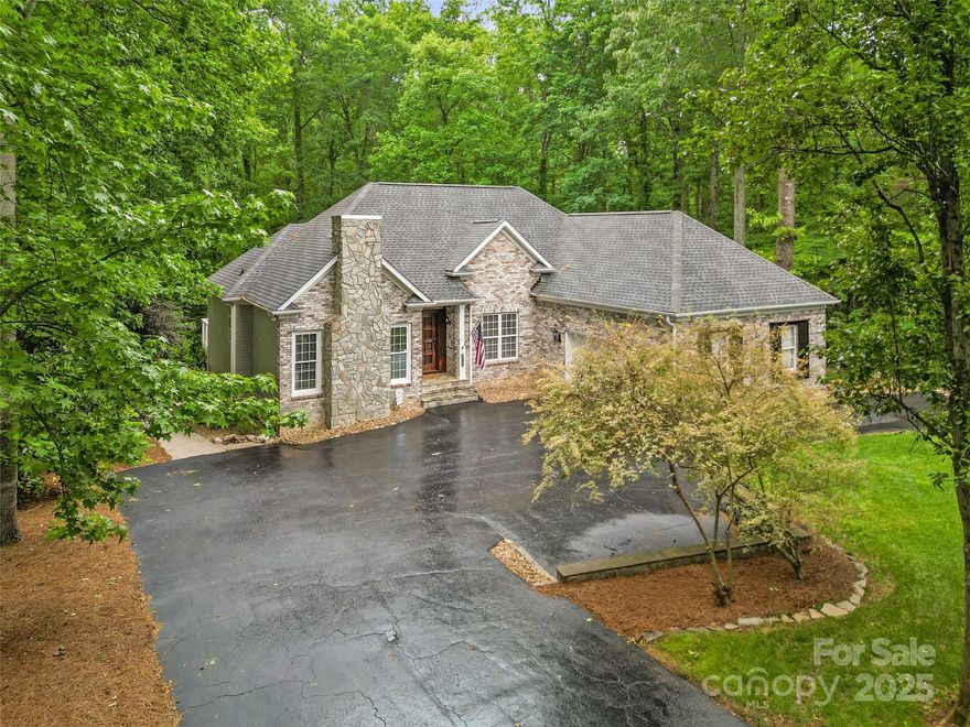 Discover the perfect blend of space, privacy, and location in this expansive 5-bedroom home set on a beautifully wooded one-acre lot. Located in a prestigious, top-rated school district, this property offers the ideal setting for buyers seeking both privacy and convenience. Step inside to find a bright floor plan with many living spaces. Kitchen features stainless steel appliances, granite countertops, ample counter space and cabinetry, flowing seamlessly into a cozy family room with a fireplace. The primary bedroom includes a luxurious primary suite with a spa-like bathroom and two closets. Find the fully finished basement below with additional bedrooms, storage, and a huge fully functioning bar! Outside, enjoy the serenity of your private wooded retreat—complete with a deck for entertaining, mature trees for shade, and plenty of room to roam. With nearby parks, shopping, and easy access to major routes, this home offers privacy without sacrificing proximity. Schedule your tour today